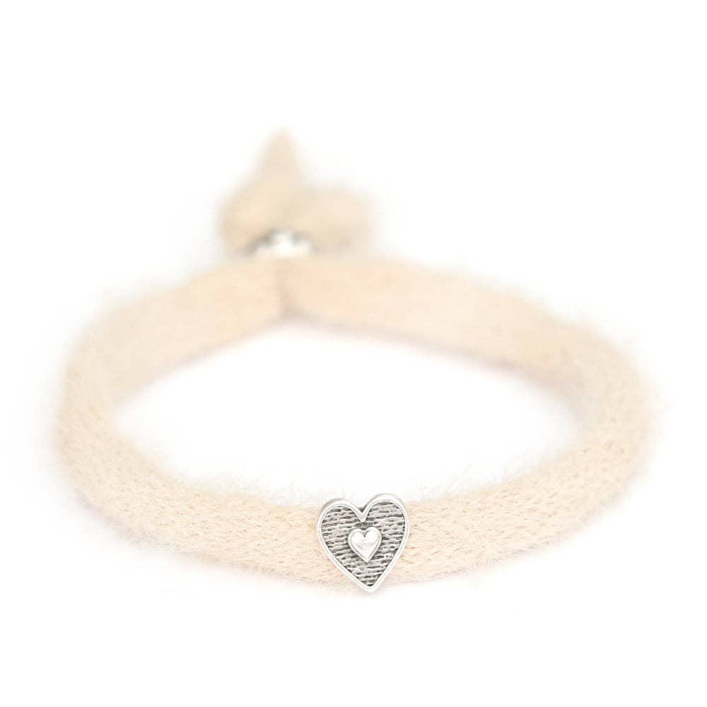 Bracelet duveteux crème argenté